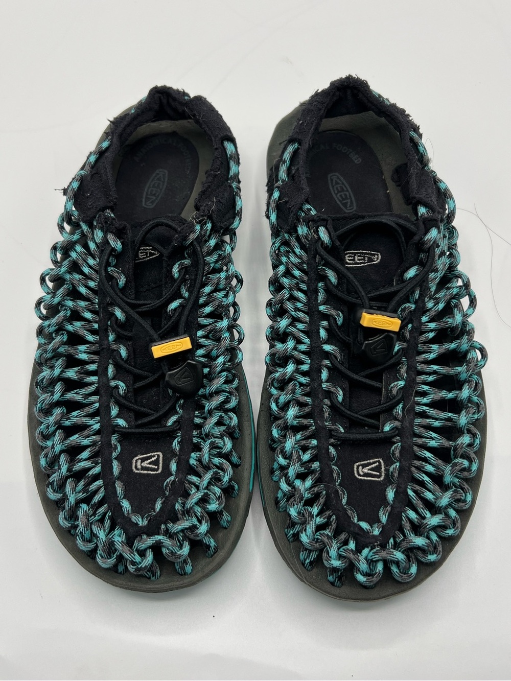 Keen woven cord black and teal slip-on sandals